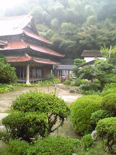 an asian house and garden, a small garden in front