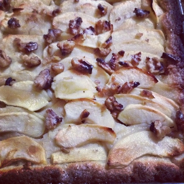 closeup of a pie with apples on top