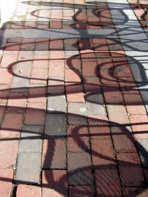 an image of an object on the ground that appears to be bicycle rackets