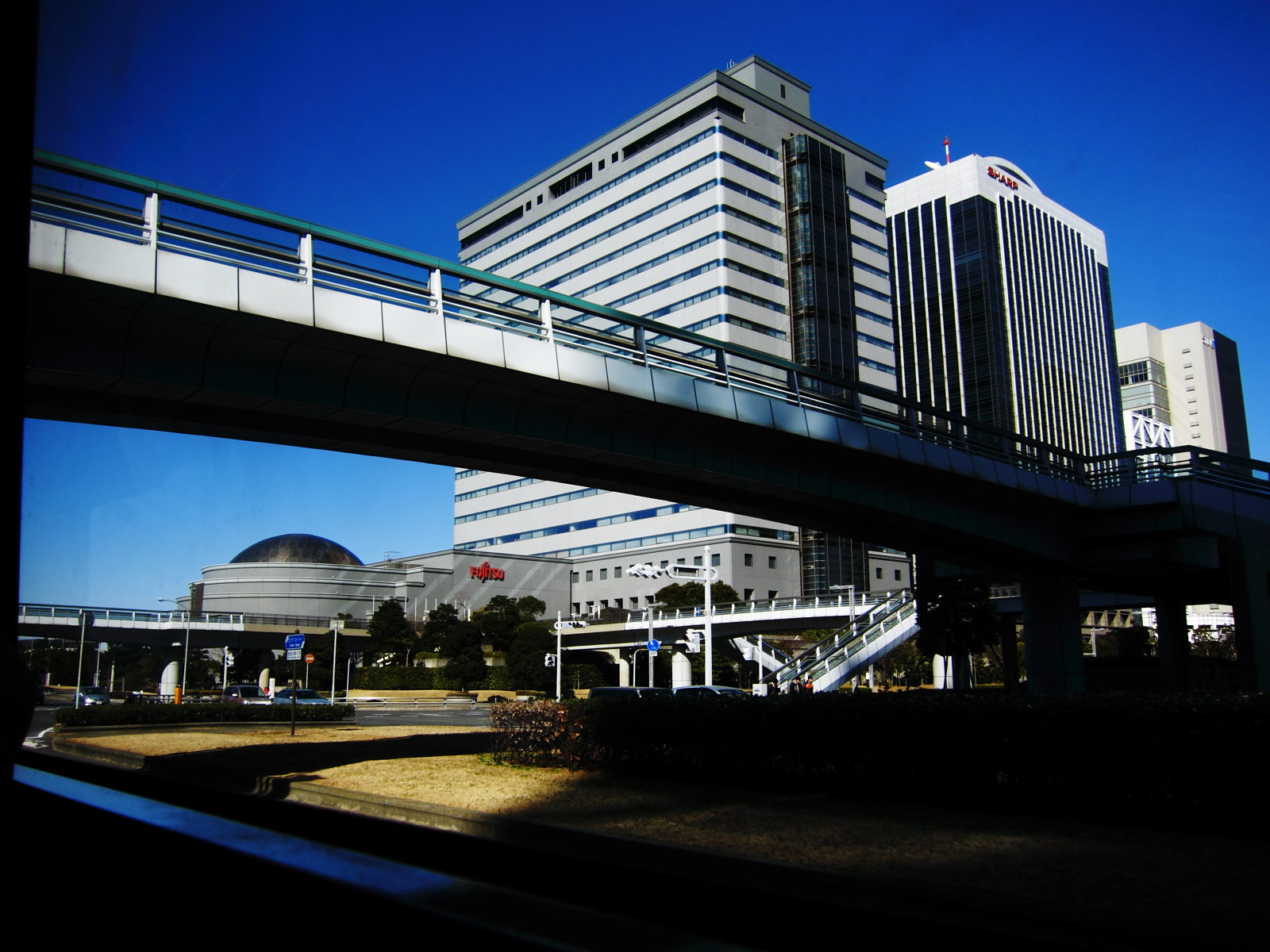 a bridge with a building in the back