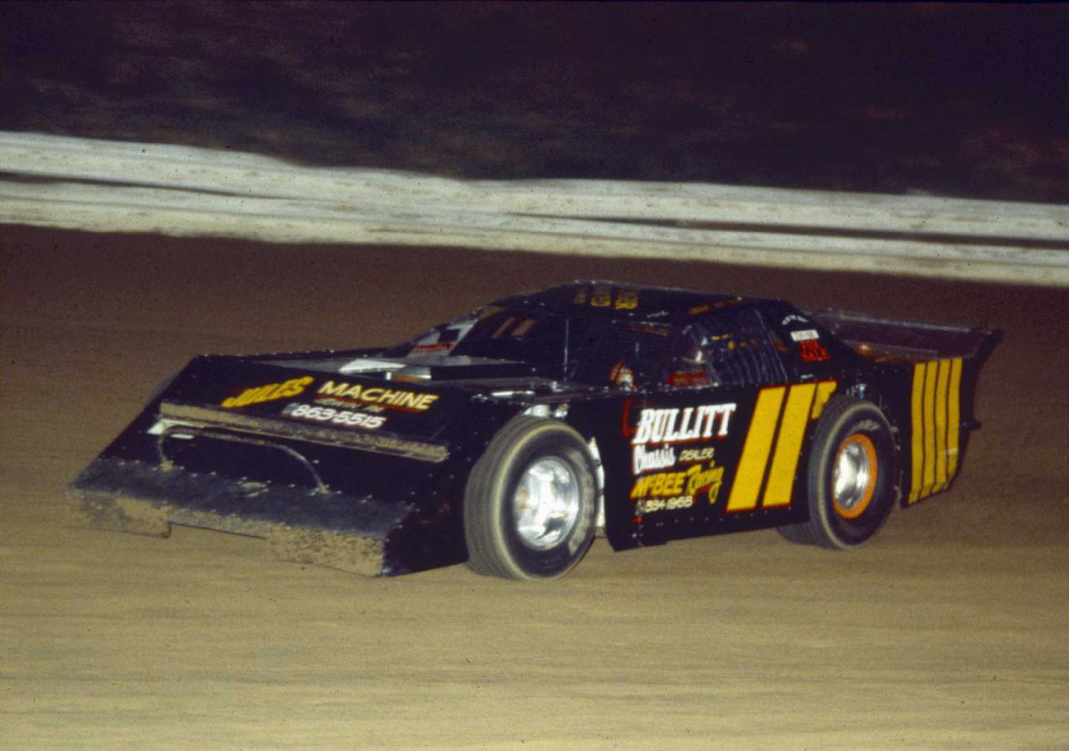 a car that is sitting in the dirt