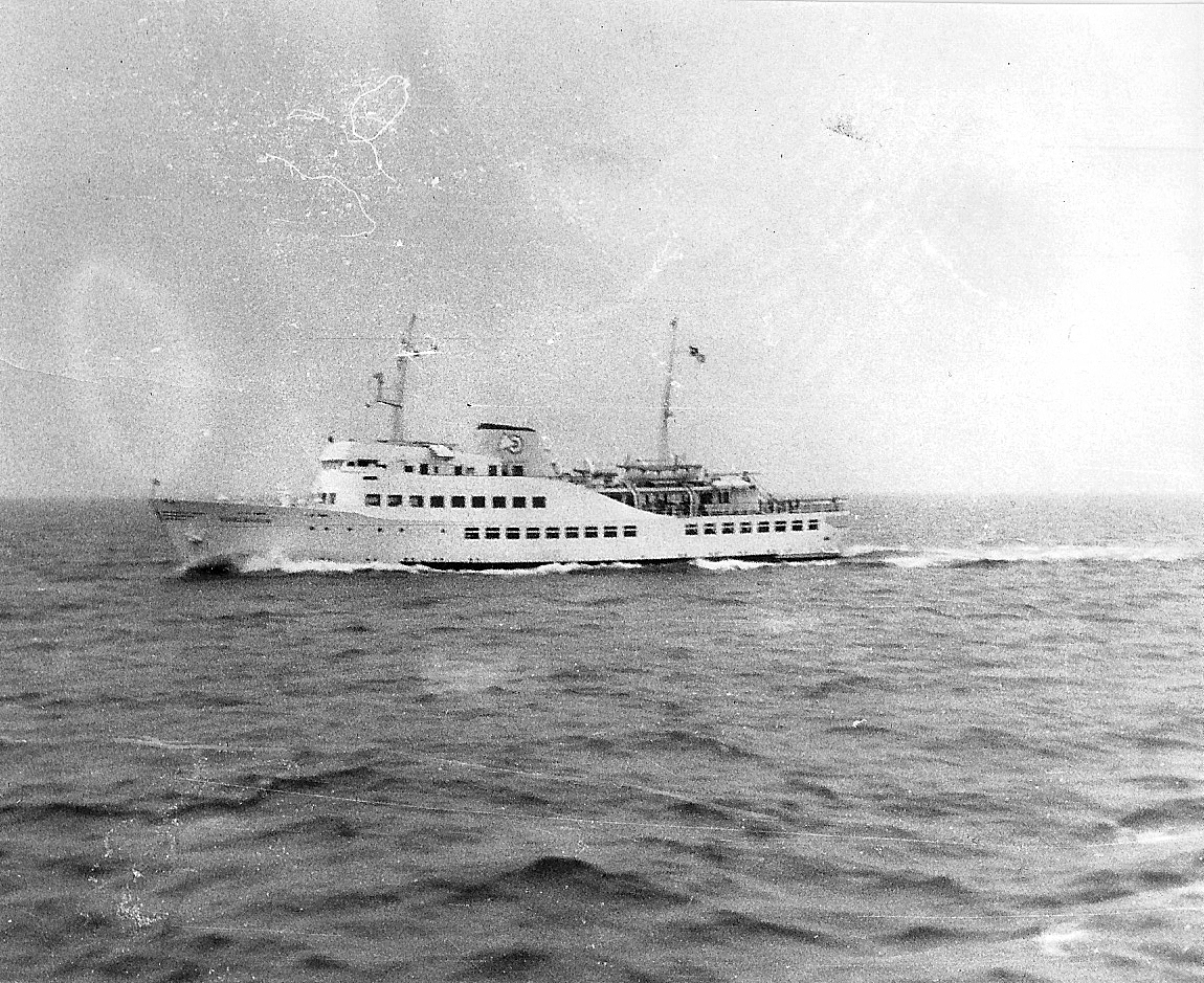 a large boat traveling on top of the ocean