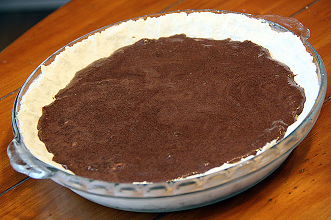 a pan with chocolate on top is ready to be baked