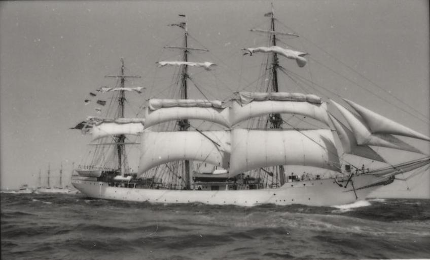 an old black and white po shows a large boat in the ocean
