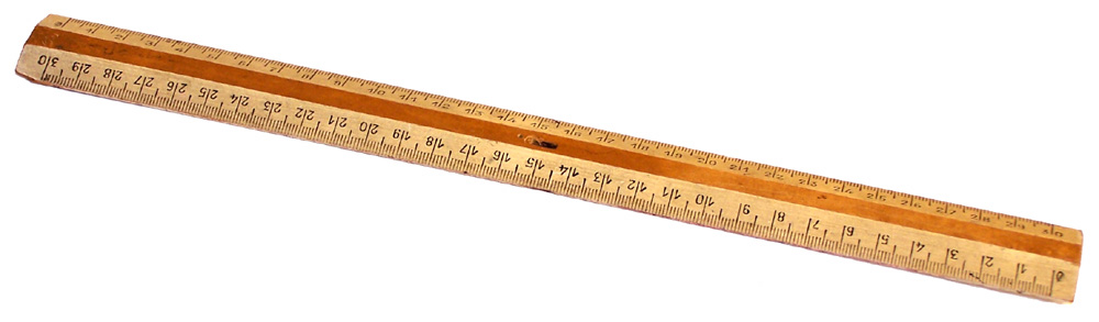 a wooden ruler, with a length gauge on top