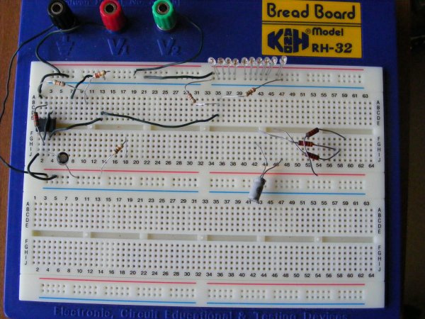 a piece of bread board containing multiple wires