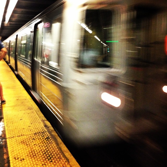 a train that is going by a platform