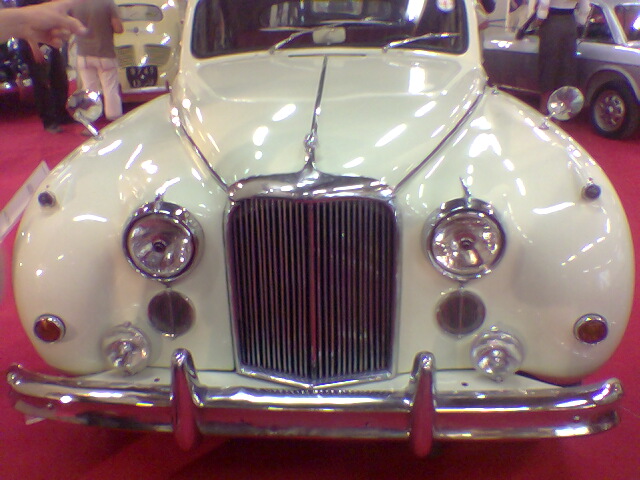 this is an antique car in a showroom