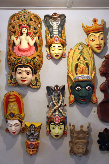 a display of indian masks on display in a store