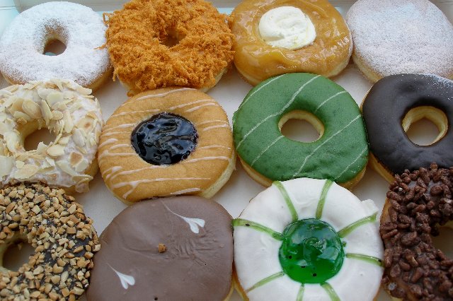 a group of doughnuts sitting in a box together