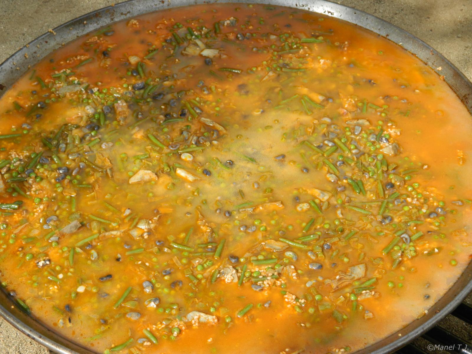 a large pot with a mixture of food in it