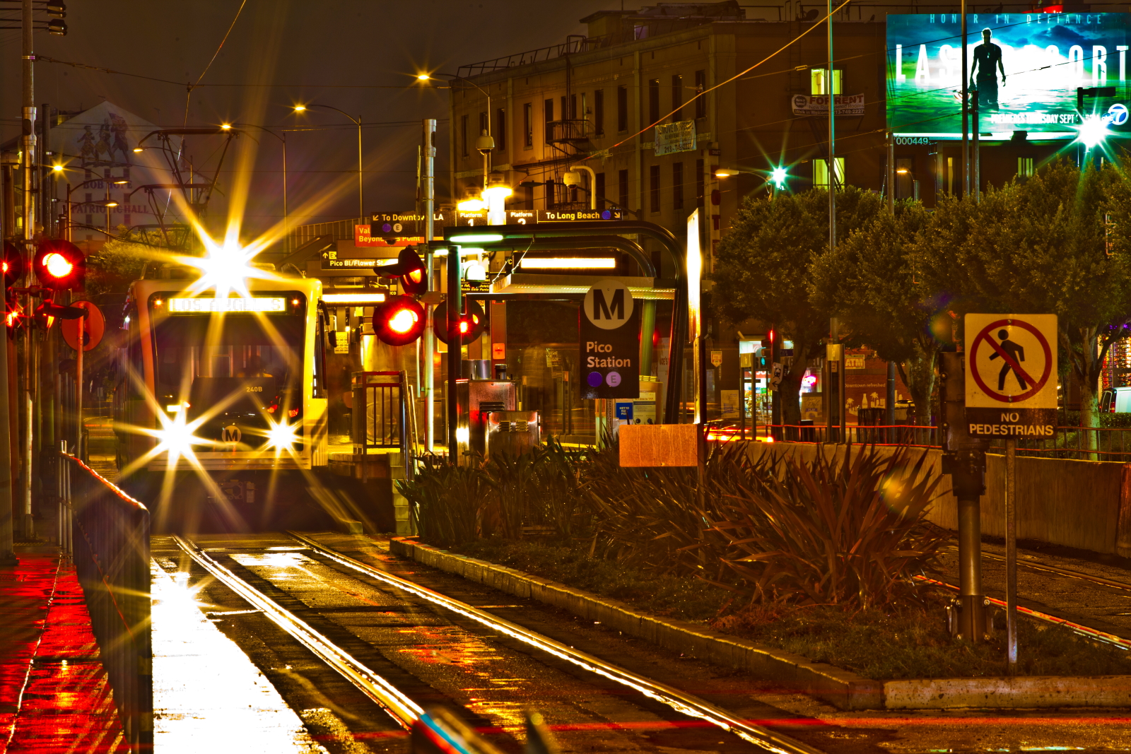 street lights shine brightly against the night sky