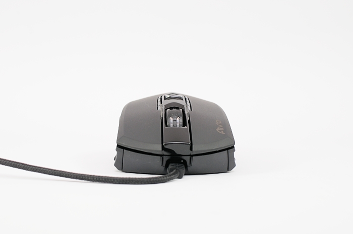 a computer mouse sitting on top of a white surface