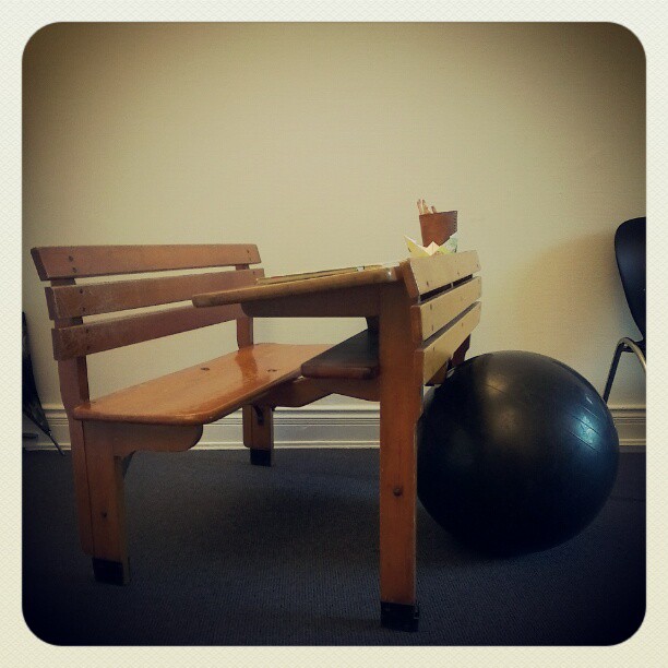 a bench is in front of a fitness ball