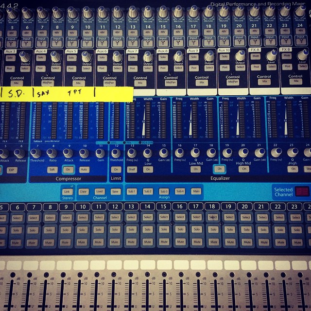 an audio mixing console is pictured with several different s