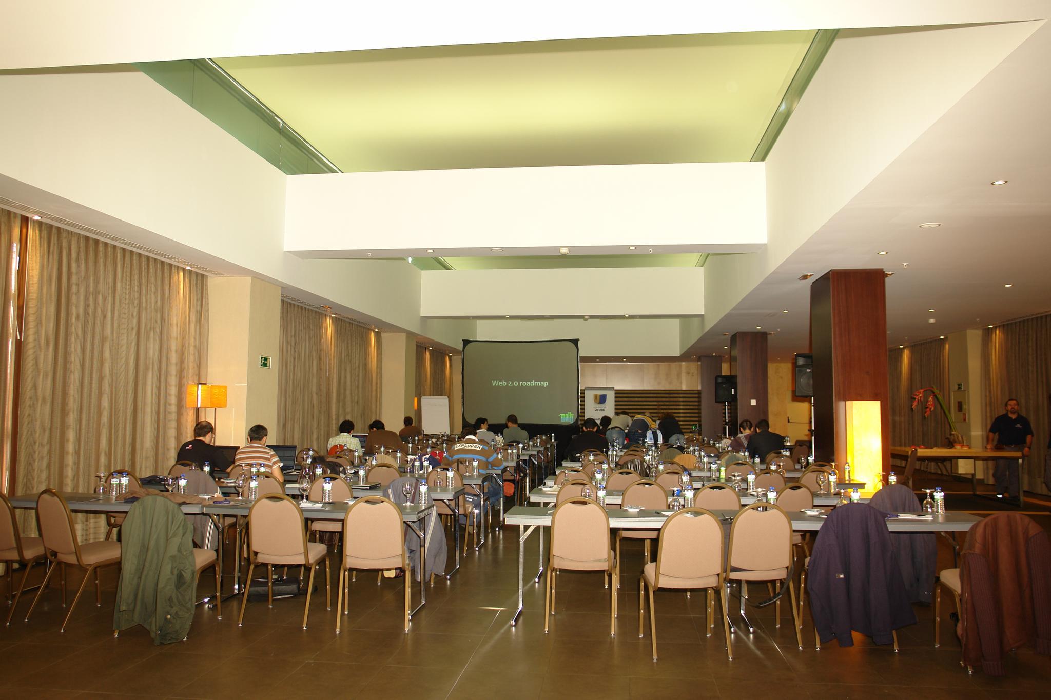 there are many people eating together at the large dining room