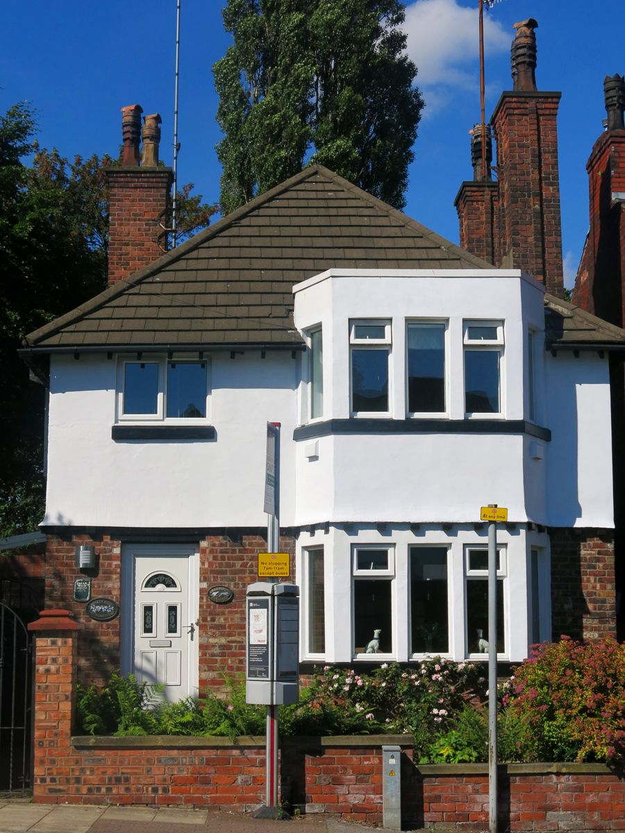 the house is very large and white in color