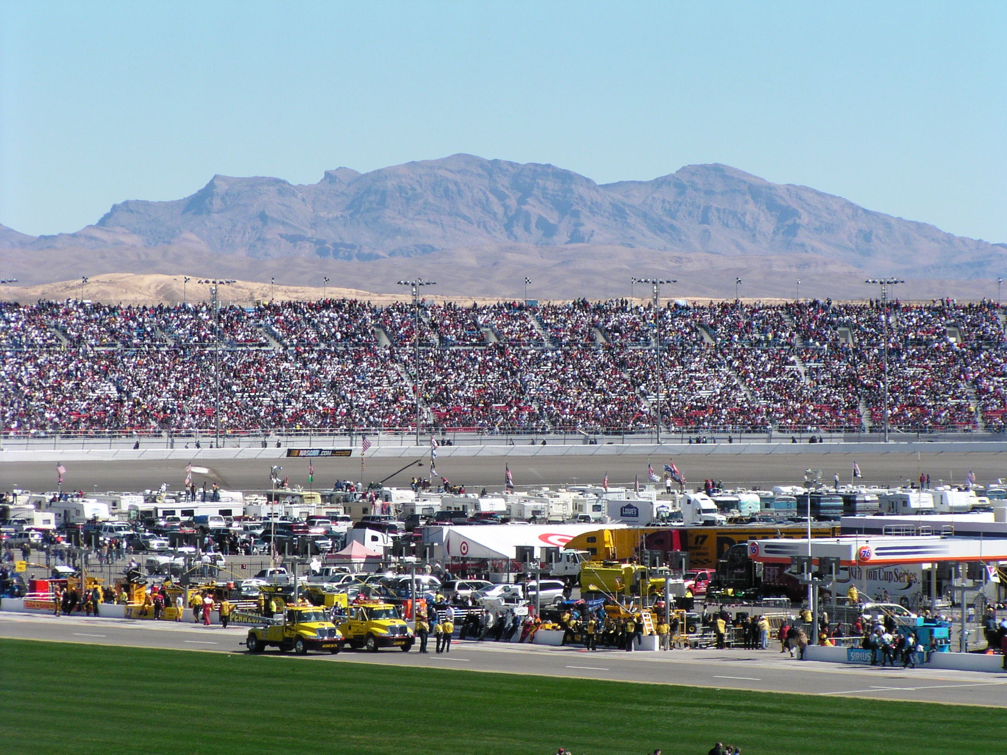 race cars lined up at the track before a race