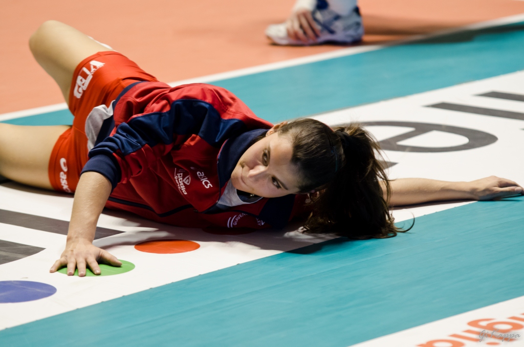a woman is on the floor with her arms and  wide