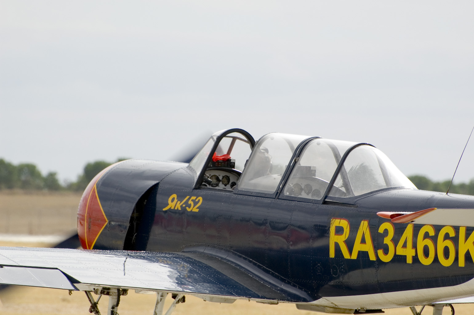 a small airplane with three propeller on top of it