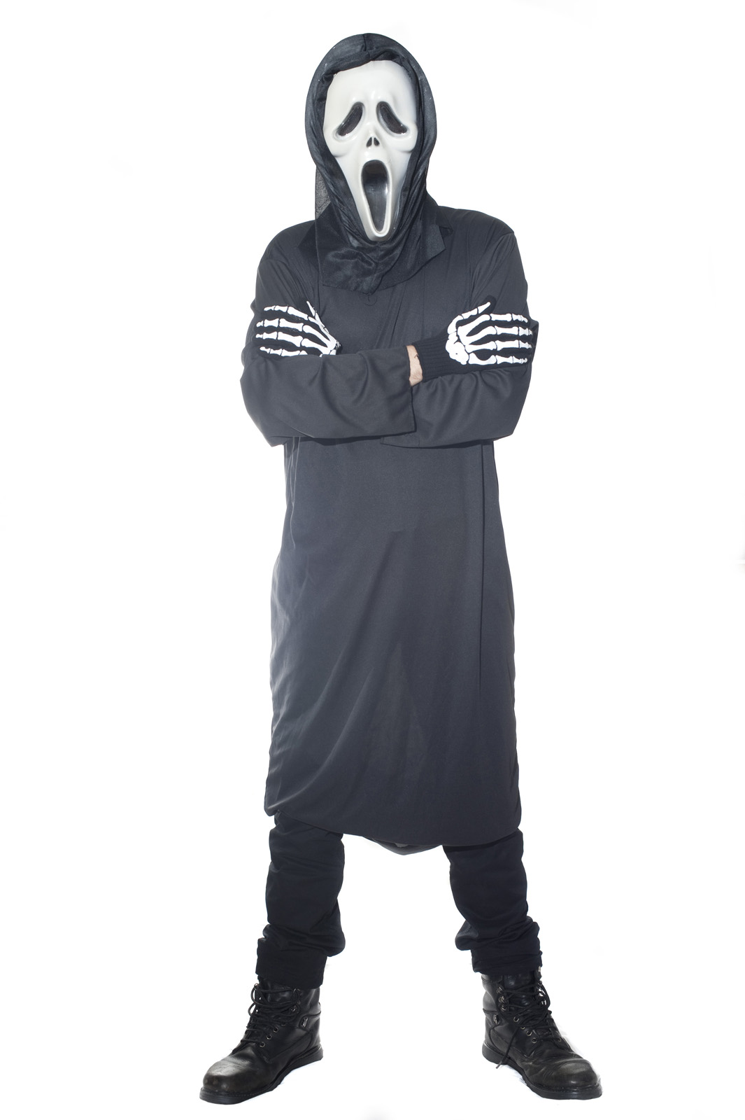 the skeleton man wearing a grey ghost suit is posing