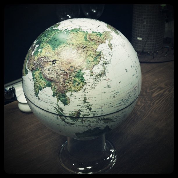 a close - up po of a globe on a table