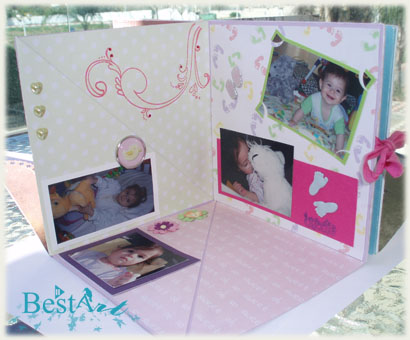a little girl album with several pos and bows