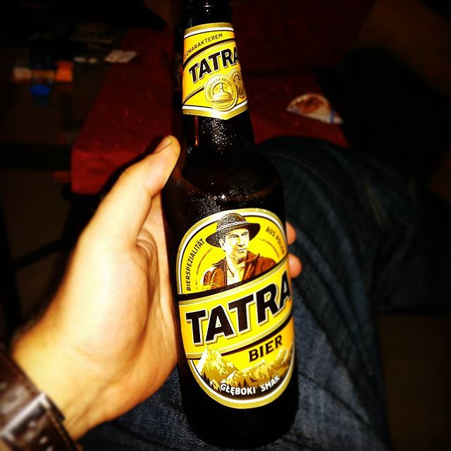 a beer bottle with the word tatra on it
