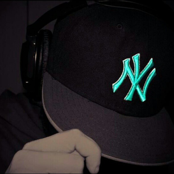 a baseball cap with the new york yankees neon inlay on it