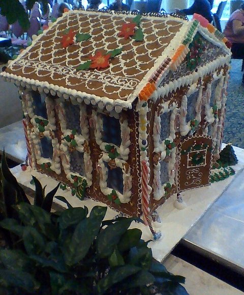 large gingerbread house for the holiday with decorations