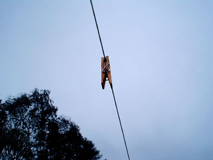 there is a large piece of paper sitting on top of the wires