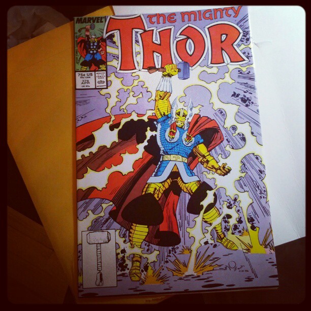 the mighty thor book with an image on it