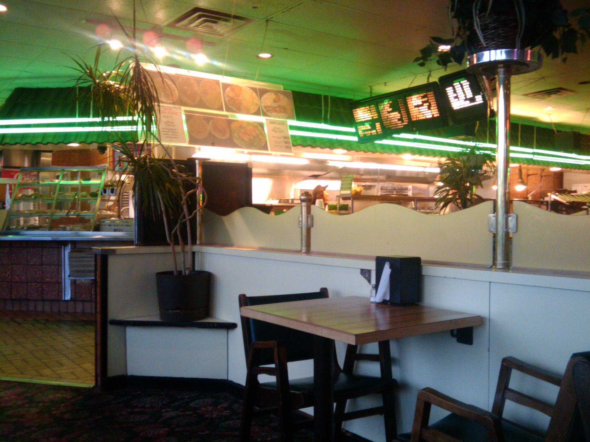 the restaurant's large windows are bright green
