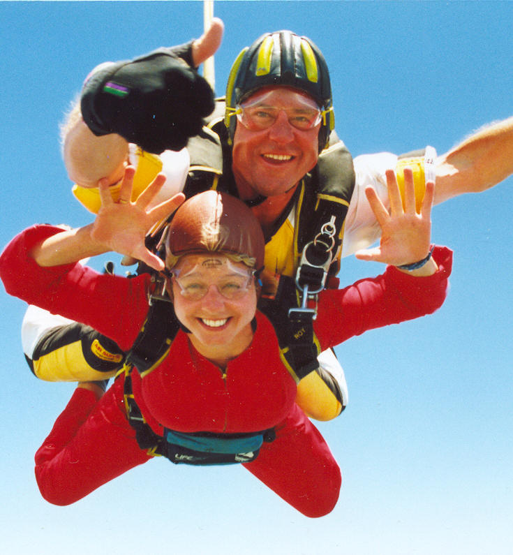 an upside down po of two people in water gear