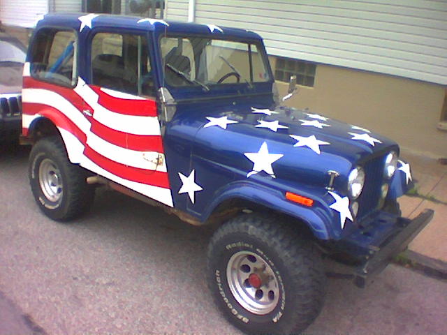 a jeep painted with an american flag