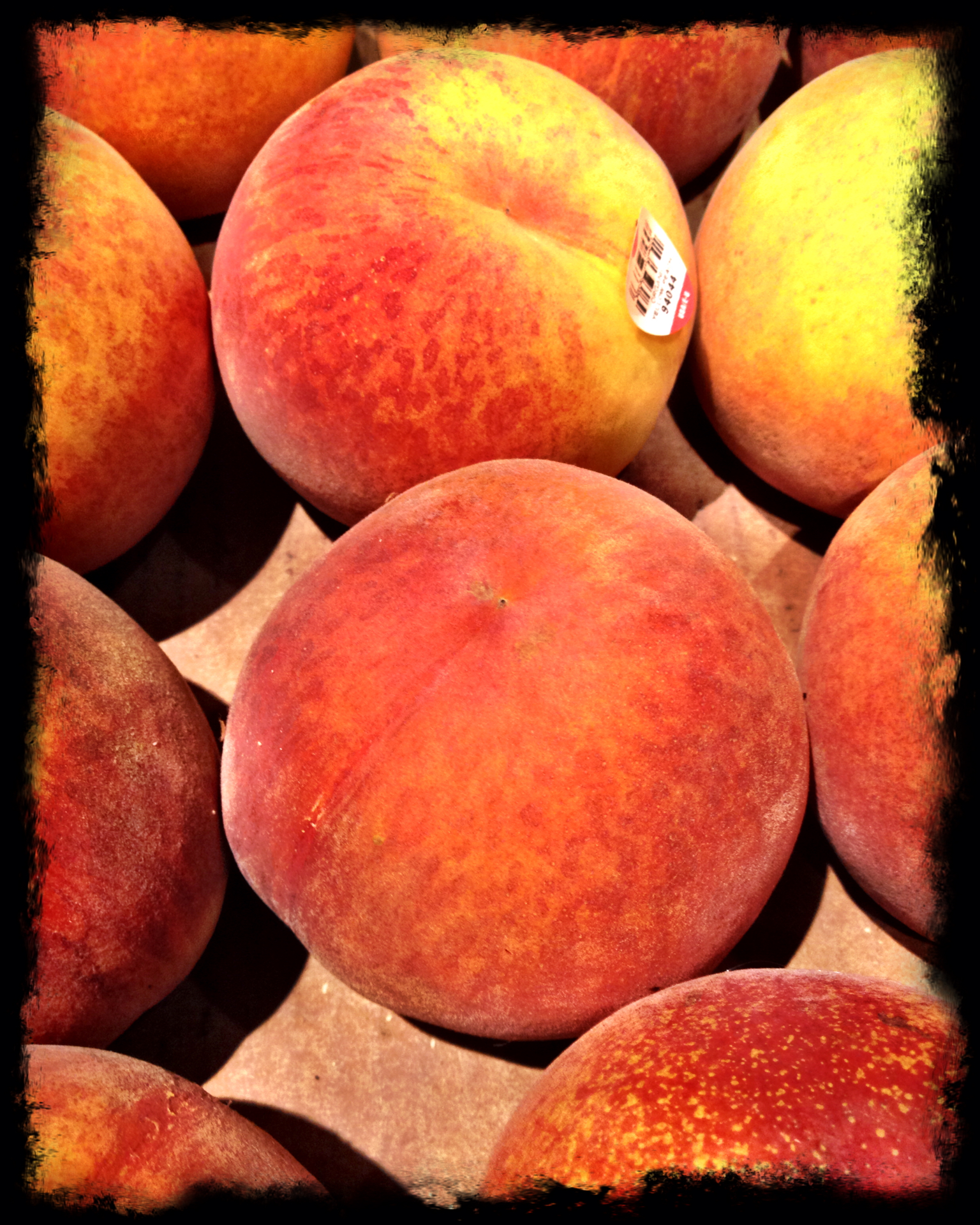 a bunch of peaches sitting together in a pile