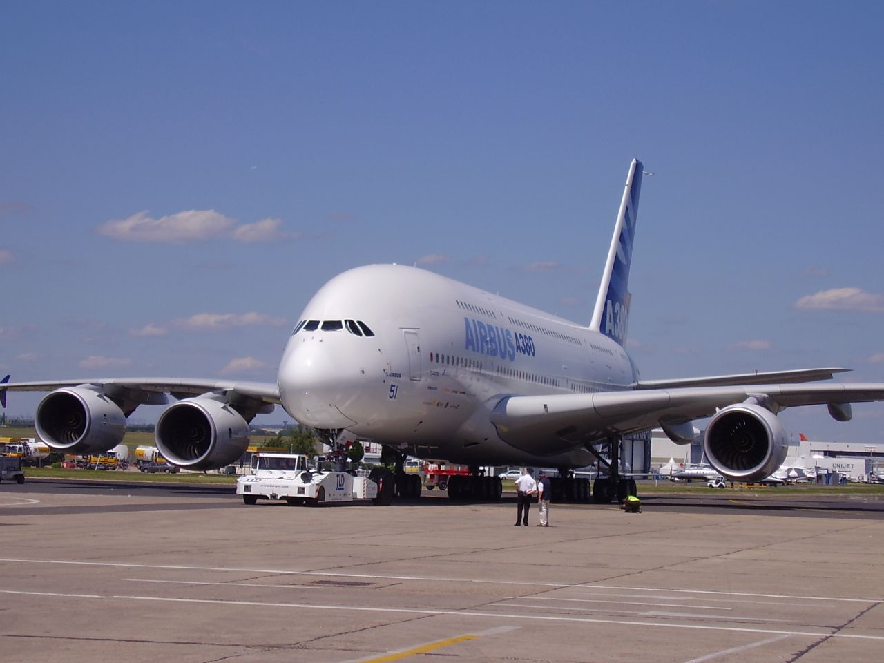 large jetliner sitting on top of an airport tarmac