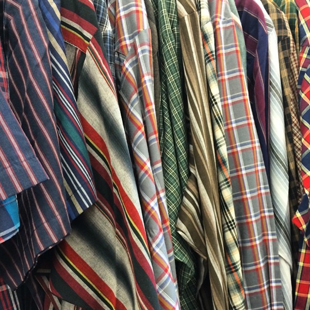 many men's ties and ties are arranged in rows