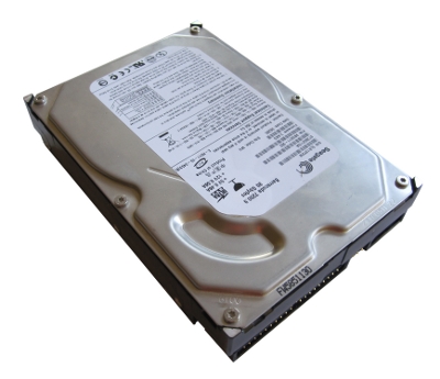a hard drive is displayed on a white surface