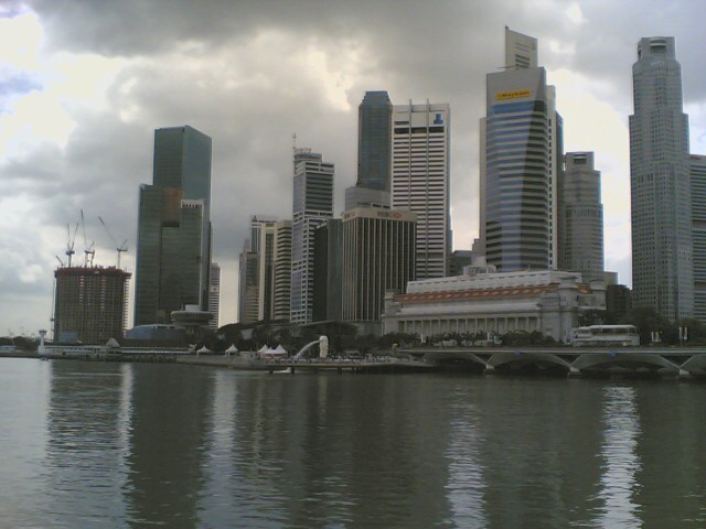 a city skyline sits across from the water