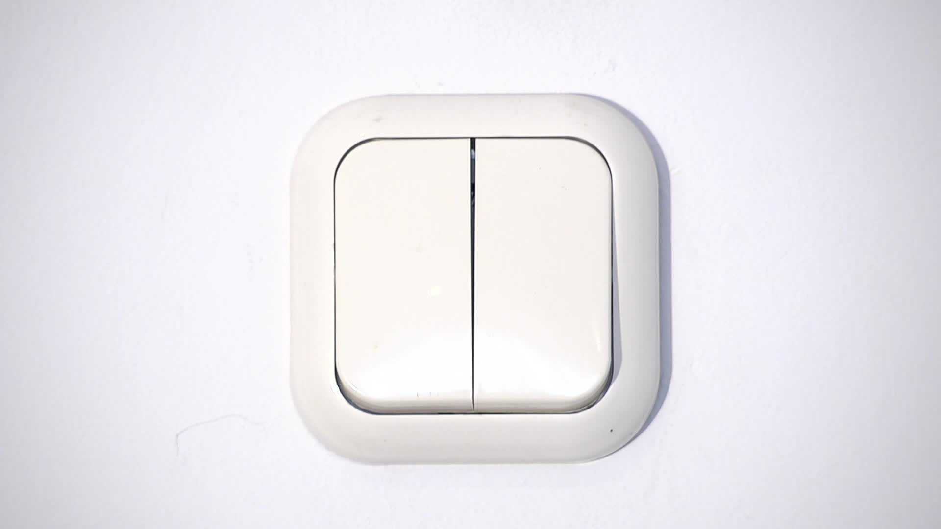 the side of a light switch mounted on a wall