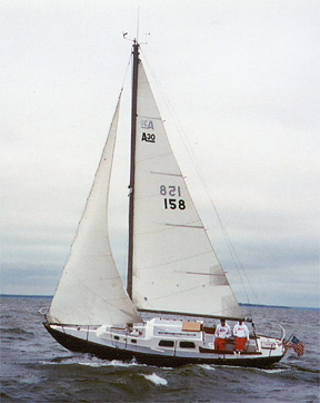 a sailboat with a number on it in the water
