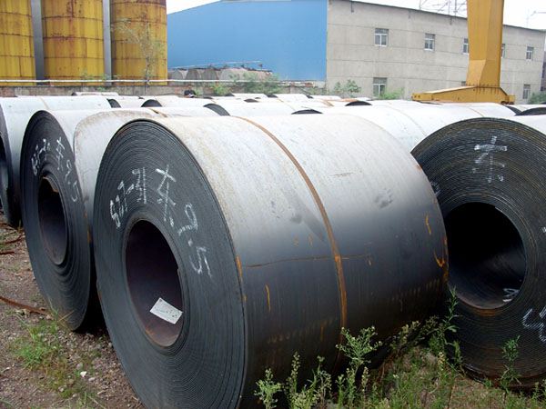 many rolls of steel with writing on them
