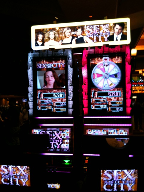 a video slot machine with several movies on top