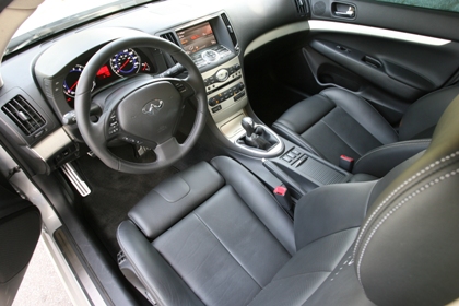 interior s of car with leather trimmed seats and dashboard