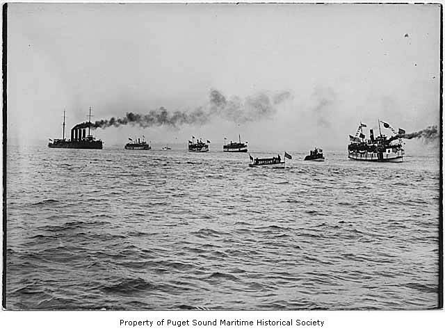 black and white pograph of ships in the ocean