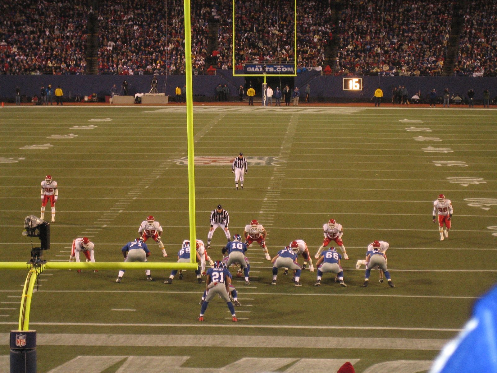 a football game with the opposing team on the field