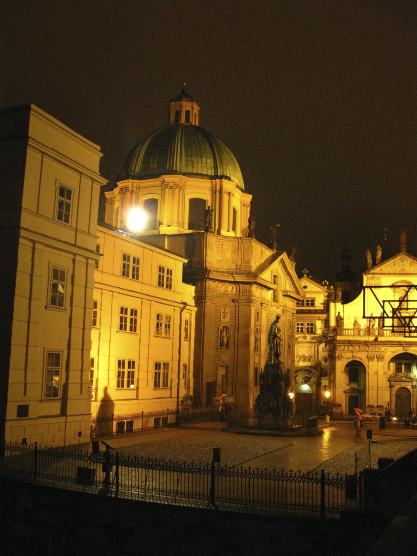 a building with a lit up tower at night