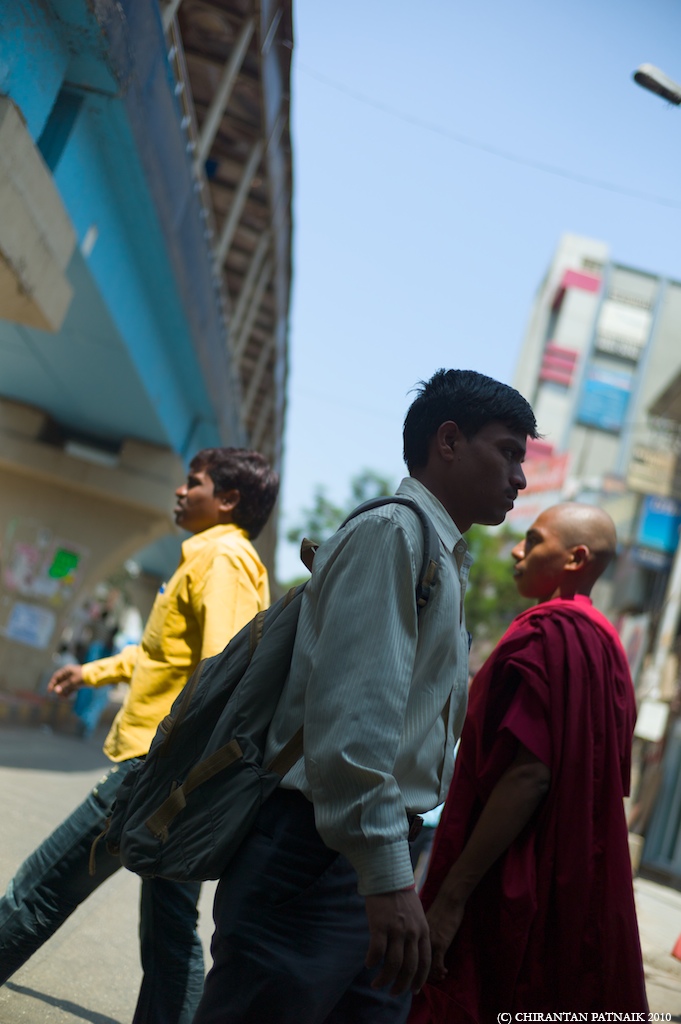 two men walking down the street