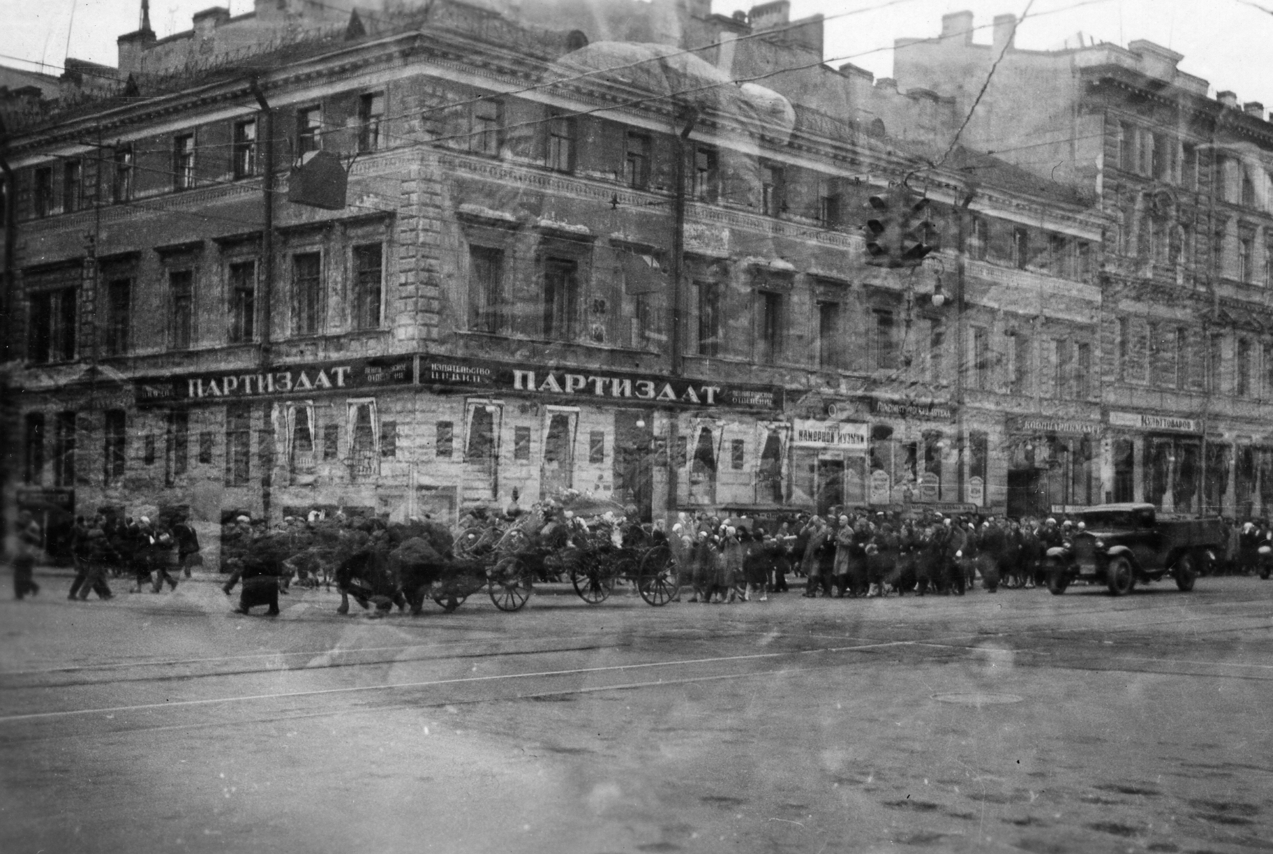 old pograph of people gathered at a medical building